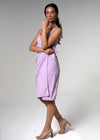 Neutral lilac wrap dress styled casually with sneakers or elegantly with heels